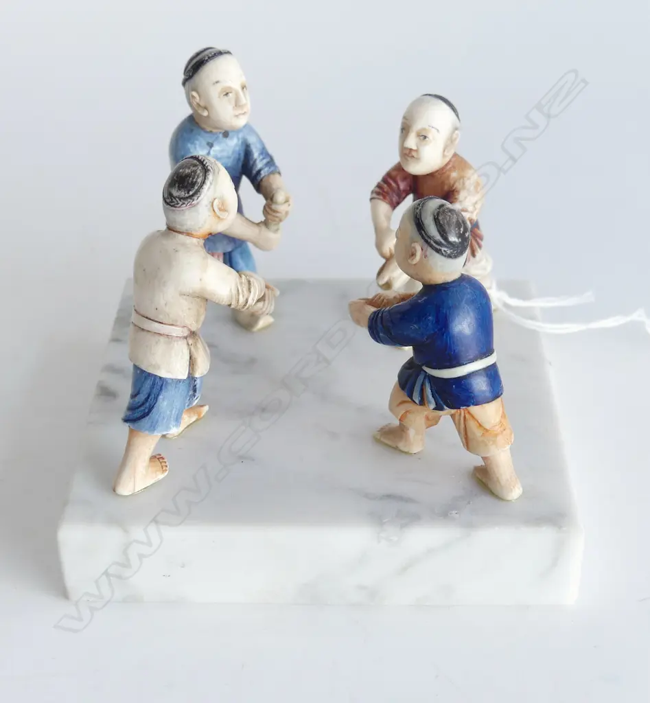 FOUR COLOURED IVORY MOUNTED FIGURES ON MARBLE PLINTH L.10CM Image 1++