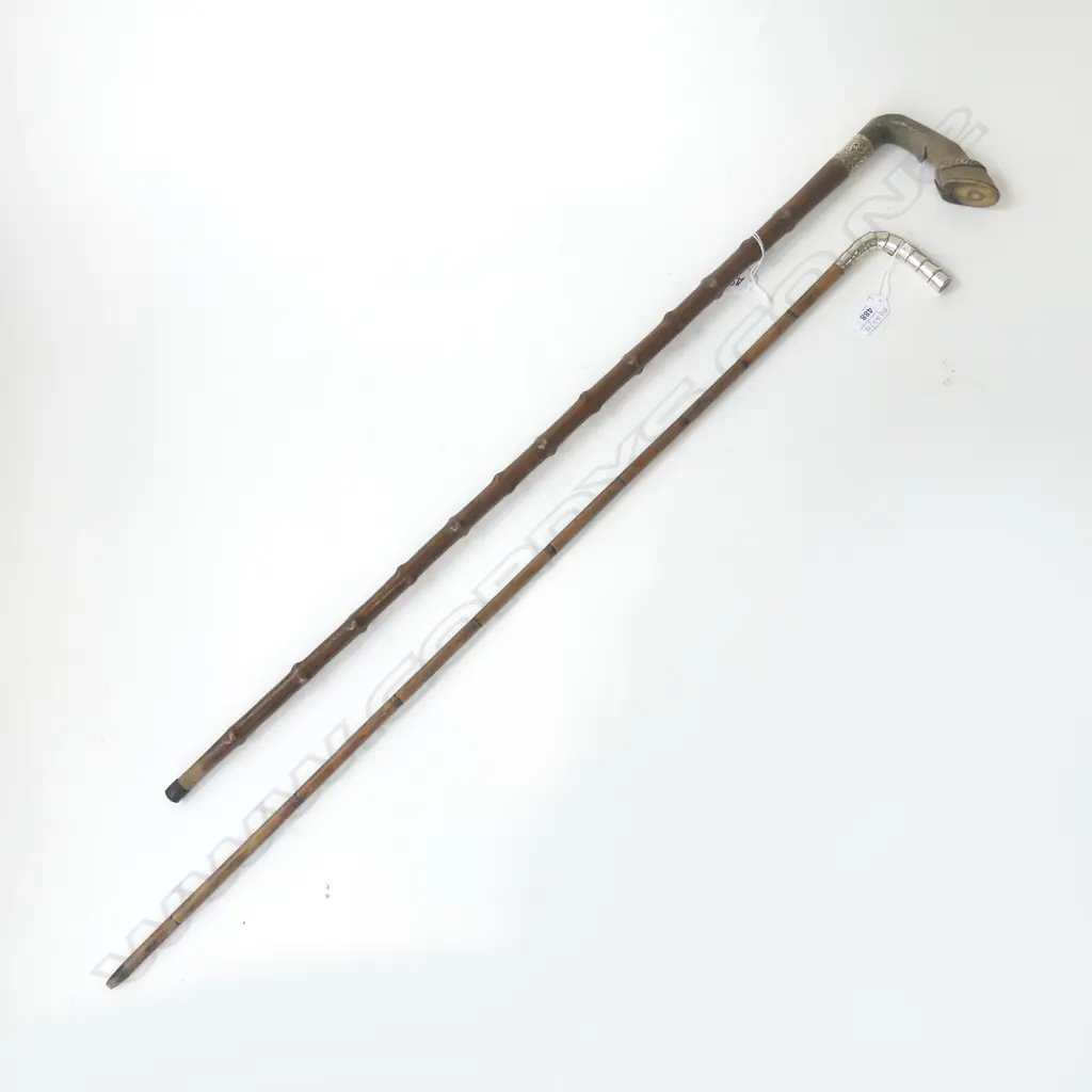 2 ANTIQUE WALKING STICKS; 1 w. STG HANDLE, 1 CARVED HORN L.900mm Image 1++