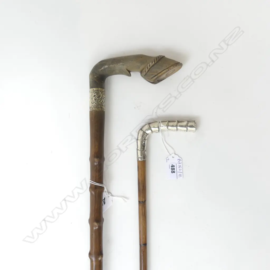 2 ANTIQUE WALKING STICKS; 1 w. STG HANDLE, 1 CARVED HORN L.900mm Image 1++