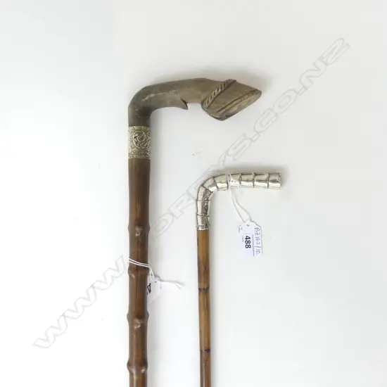 2 ANTIQUE WALKING STICKS; 1 w. STG HANDLE, 1 CARVED HORN L.900mm