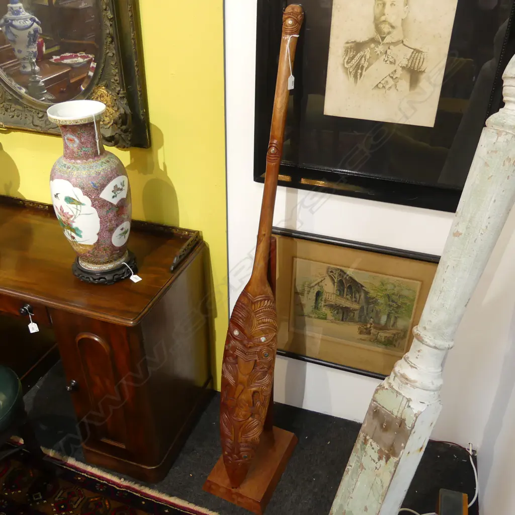 WAKA HOE; MAORI CARVED WOODEN ORNAMENTAL CANOE PADDLE L.1510mm ON STAND H.870mm Image 1++