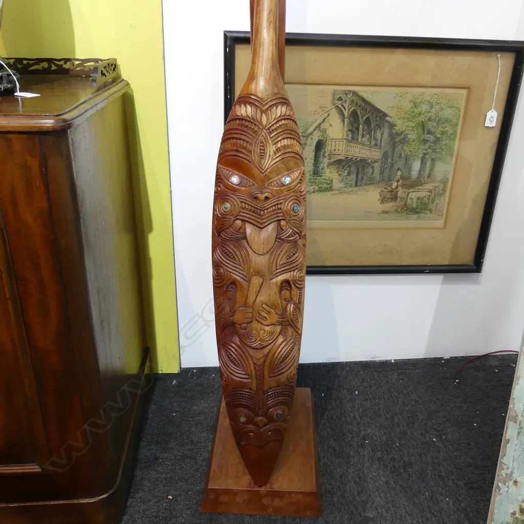 WAKA HOE; MAORI CARVED WOODEN ORNAMENTAL CANOE PADDLE L.1510mm ON STAND H.870mm Image 1++