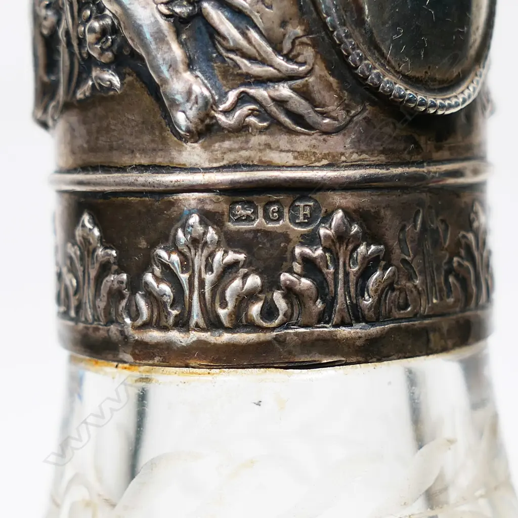 A Continental silver cased glass decanter Image 1++