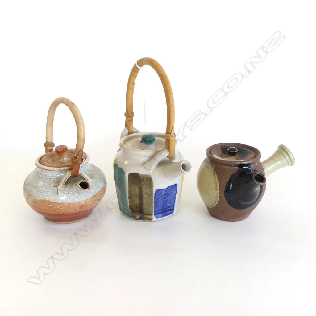 3 VINTAGE NZ STUDIO POTTERY TEAPOTS, 2 w CANE HANDLES & POTTERS MARKS & 1 OTHER Image 1++