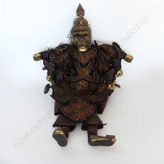 An old Burmese gilt teak wood puppet with ten arms traditional costume, studded with sequins & glass beads. H.850mm