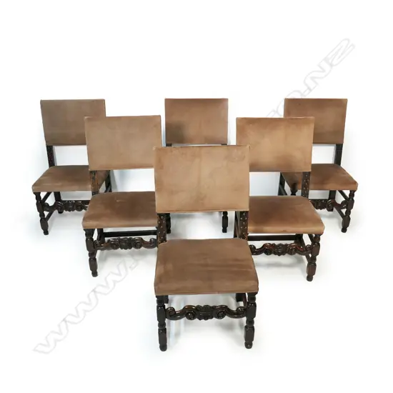 A set of six Charles II style oak dining chairs,