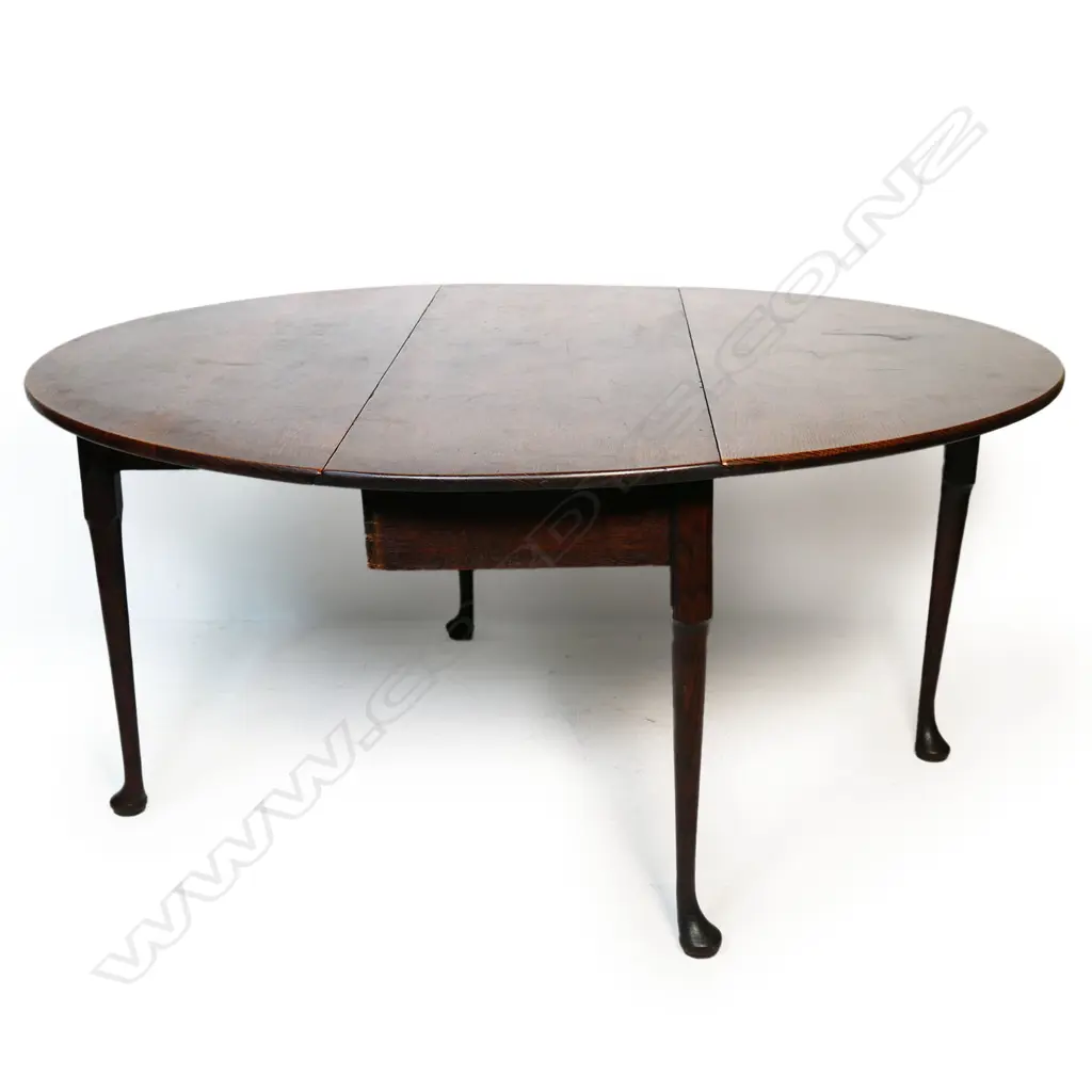 A Georgian oak drop leaf table, Image 1++