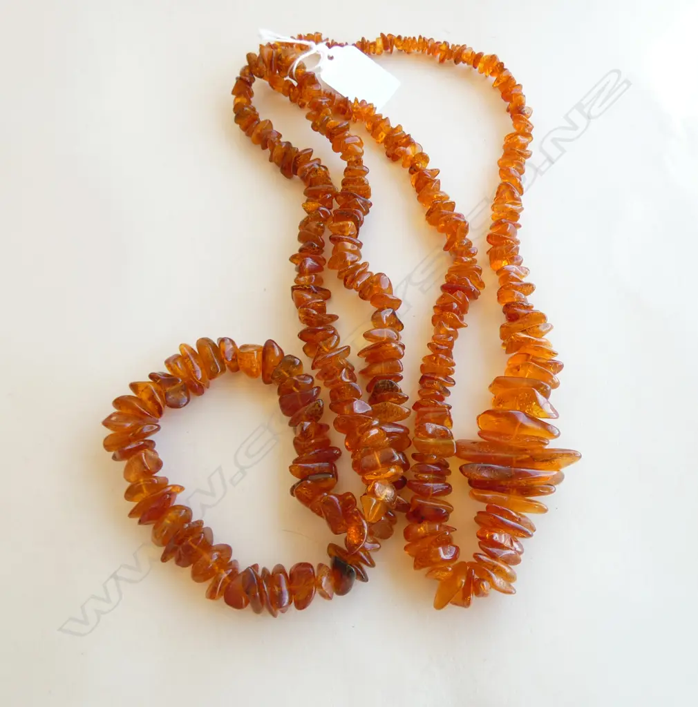 TWO LONG AMBER CHIP NECKLACE L.600mm ea approx Image 1++