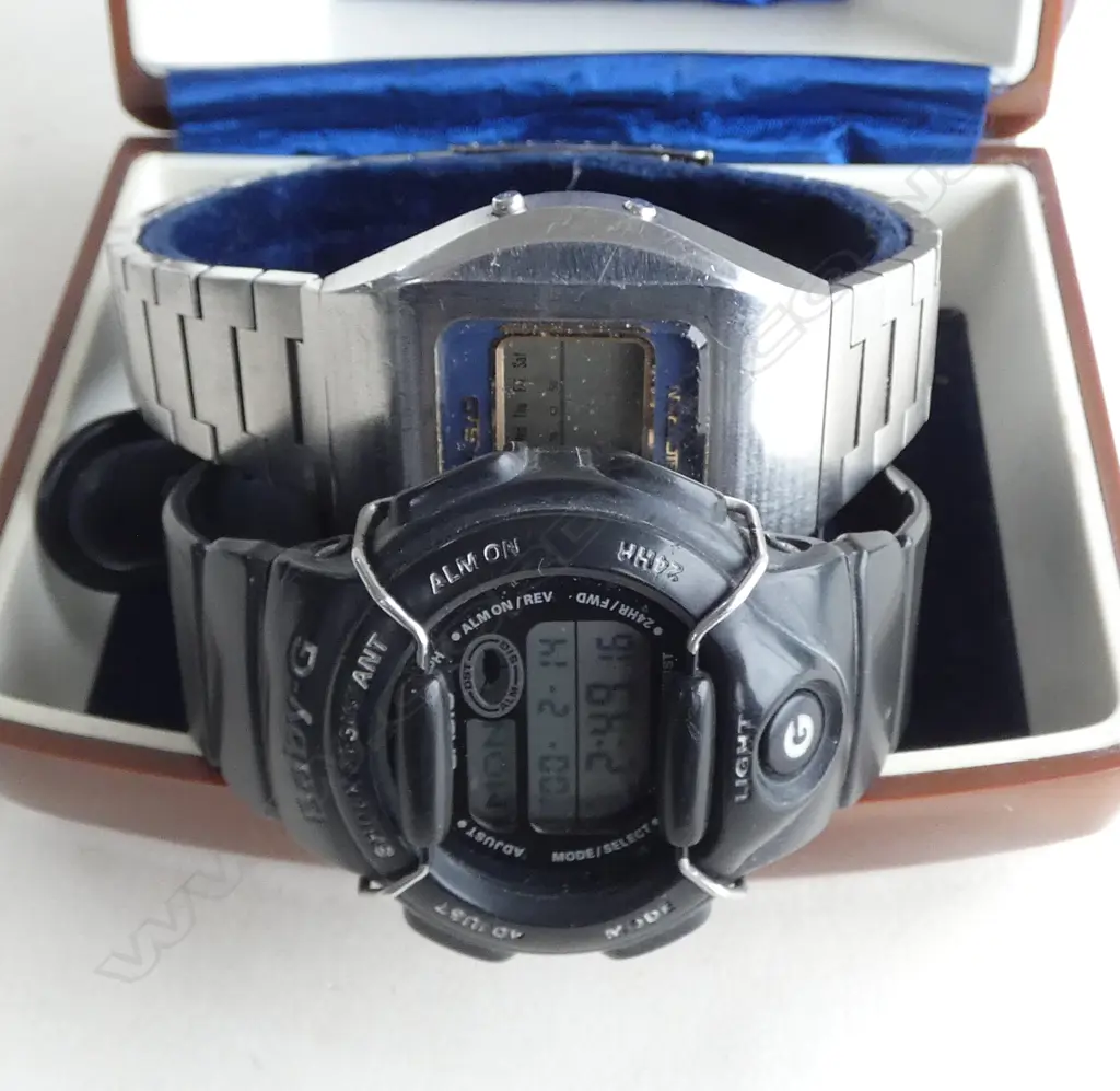 2 CASIO WATCHES IN BRANDED CASE; CASIOTRON NOT RUNNING, BABY G RUNNING Image 1++