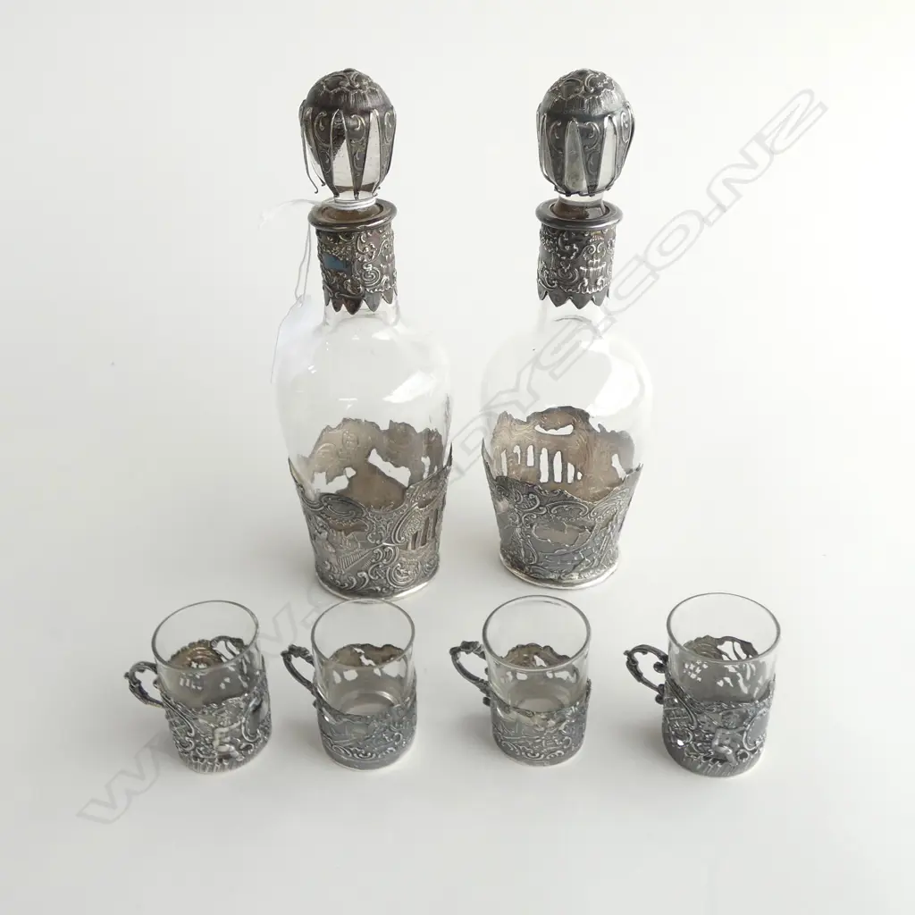 PR 19thC EUROPEAN EMBOSSED SILVER & GLASS LIQUOR DECANTERS & 4 MINI CUPS. Import marks Edinburgh 1892 slight faults  Image 1++