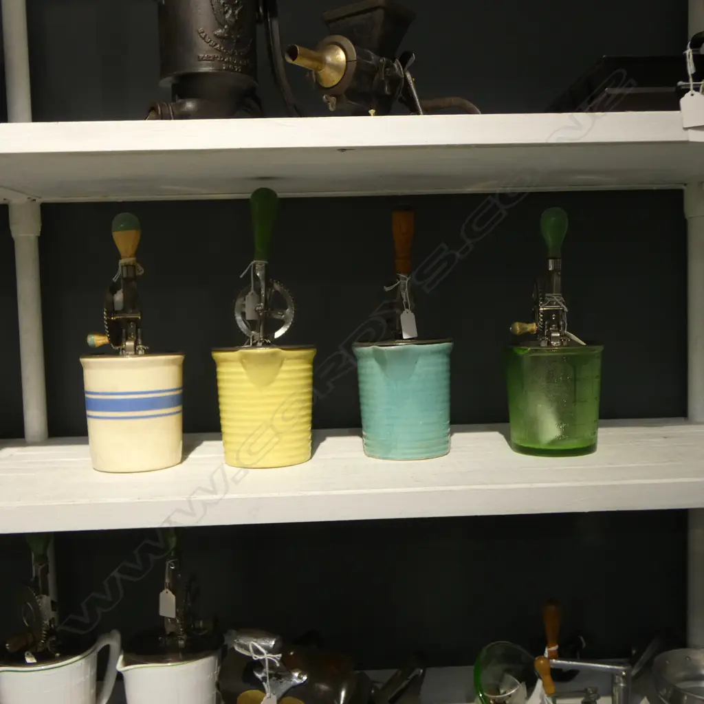 (3185/2848/3169) 3 VINTAGE HAND HELD ROATARY BEATERS; 3 ON CERAMIC MEASURES & 1 GREEN GLASS H.310mm Image 1++