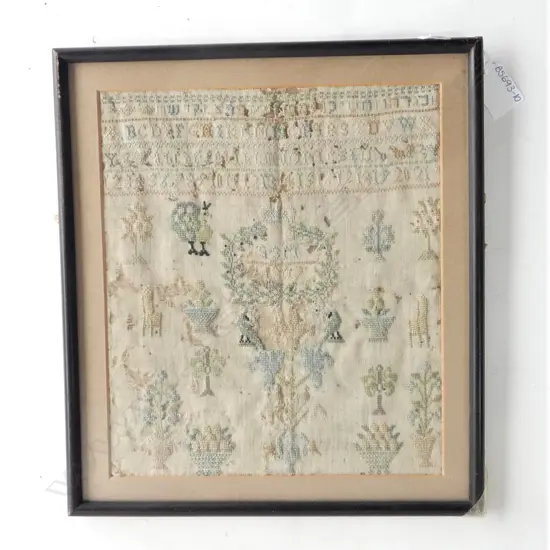 A framed antique alphabet German sampler c.1807 230 x 265mm some damage and fading...,
