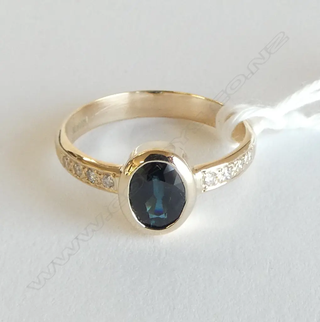 9ct Y/G DIAMOND & SAPPHIRE DRESS RING sapphire 1.02ct. 8x Diamonds TDW 0.10ct. 2.71gms. Size P Image 1++