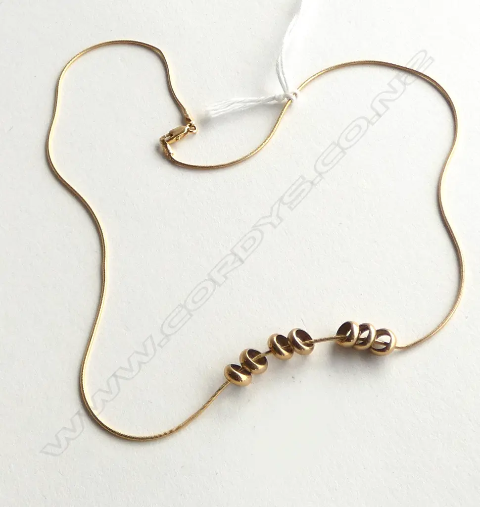 9CT GOLD FINE CHAIN WITH SEVEN RINGS NECKLACE 7gm Image 1++