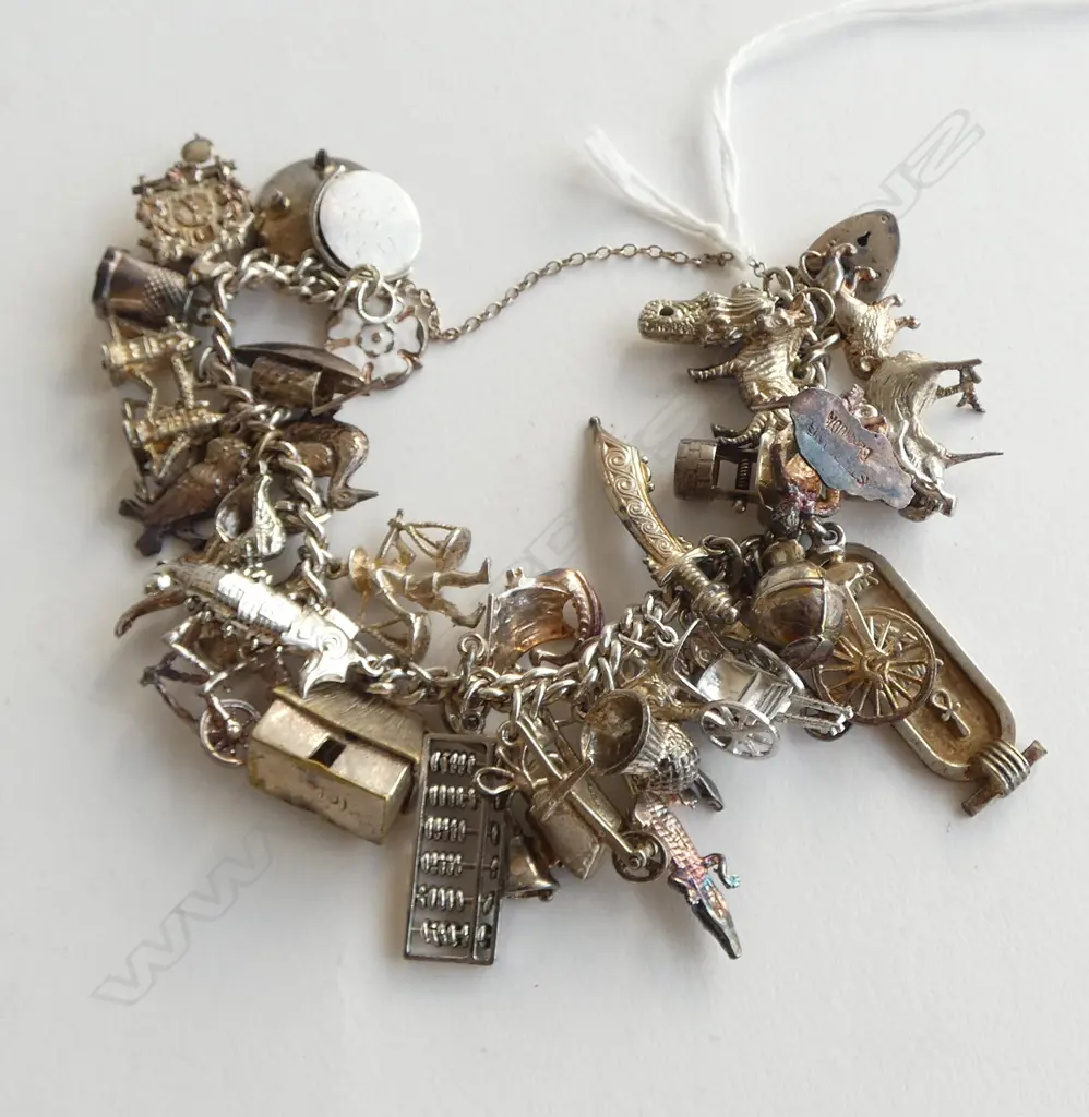 SILVER HEAVILY LOADED CHARM BRACELET approx 40 charms 78gms Image 1++
