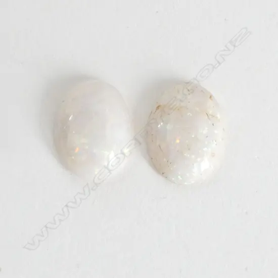 PR MILKY OPALS, CABACHON CUT, 8.4ct FAULTS