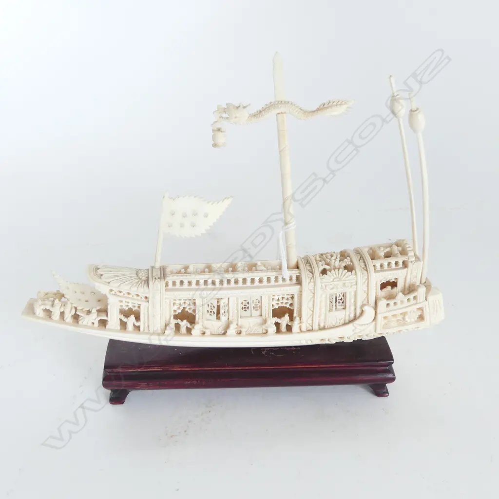 CHINESE FINELY CARVED IVORY ELABORATE JUNK on wood stand with flag & asst poles. L.205mm. Image 1++