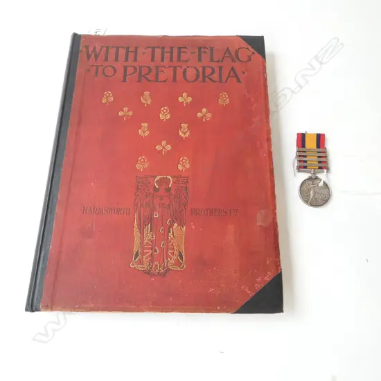A Victorian South African medal and a copy of 'With the Flag to Pretoria',