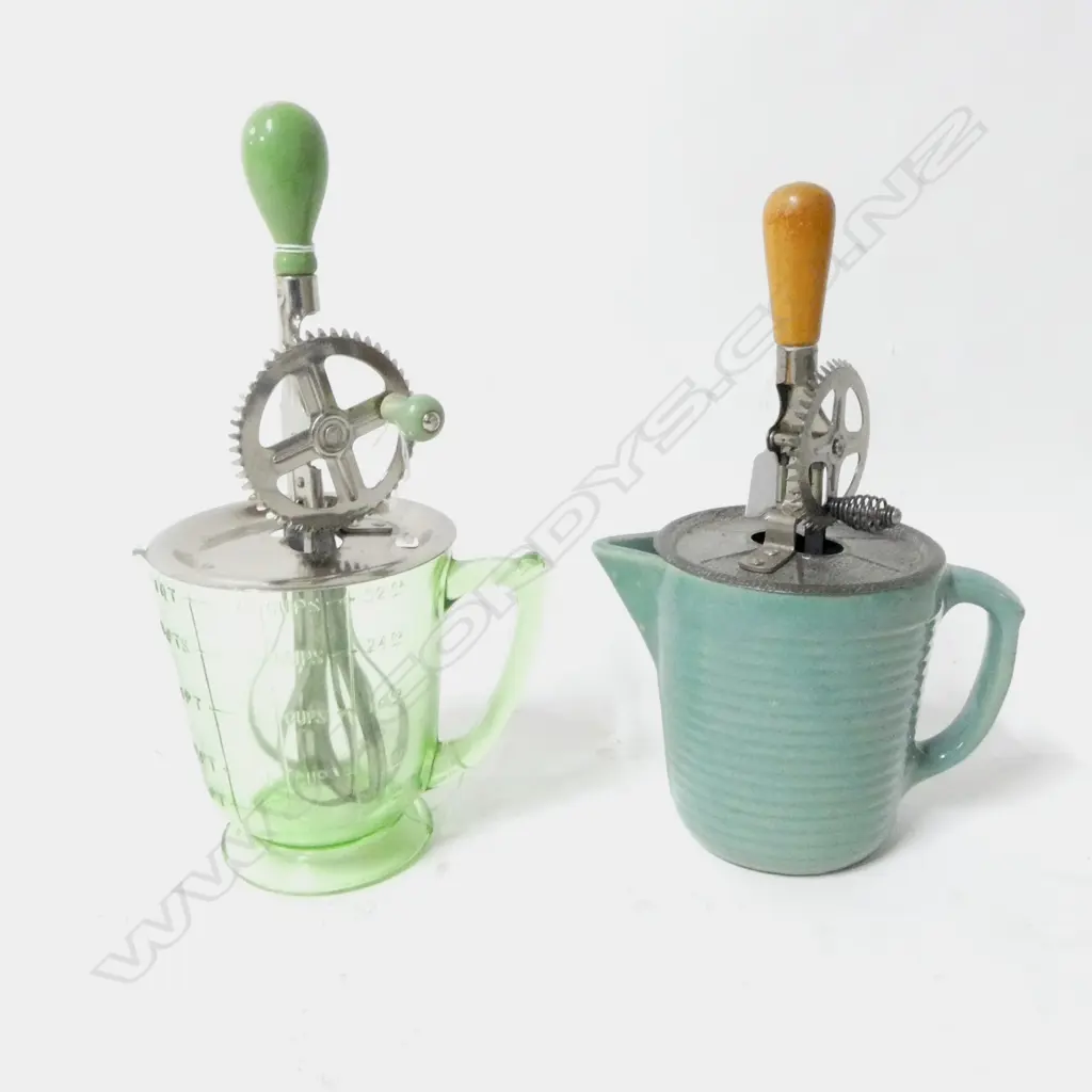 (3389/3025/3131) 2 VINTAGE HAND HELD ROTARY BEATERS ON JUGS (GREEN & CERAMIC) H.320mm Image 1++