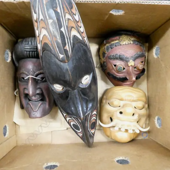 COLLECTION OF 4 CARVED WOOD MASKS