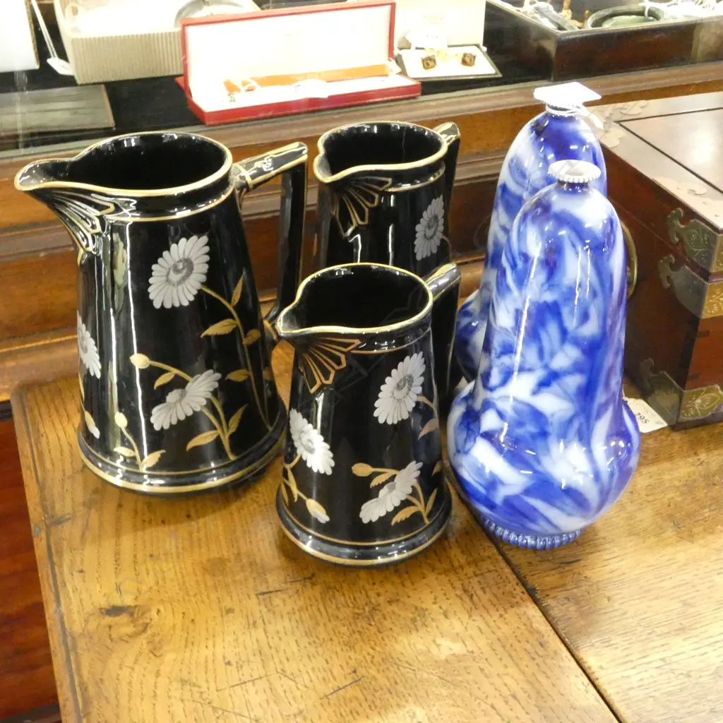 3 VICTORIAN GRADUATING BLACK JUGS + PR B/W VASES hairlines H. 220mm Image 1++
