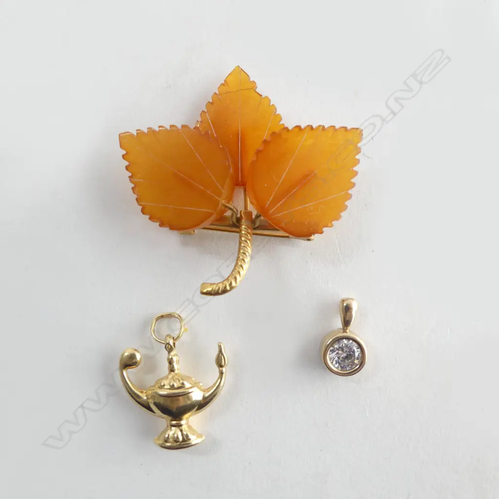 3 GOLD PCES; 9CT OIL LAMP CHARM not marked 2.1grms, CZ PENDANT 1.1grms, 9CT LEAF BROOCH  Image 1++