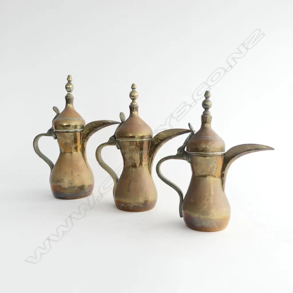 3 MIDDLE EASTERN COPPER JUGS H.305mm Image 1++