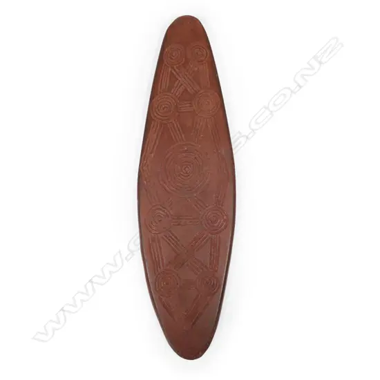 A mid 20thC or earlier Aboriginal stone churinga (totem) lenticular