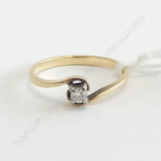 **RTV** 14ct y/w DIAMOND SOLITAIRE RING, 1.8gm dia=0.06ct SIZE O