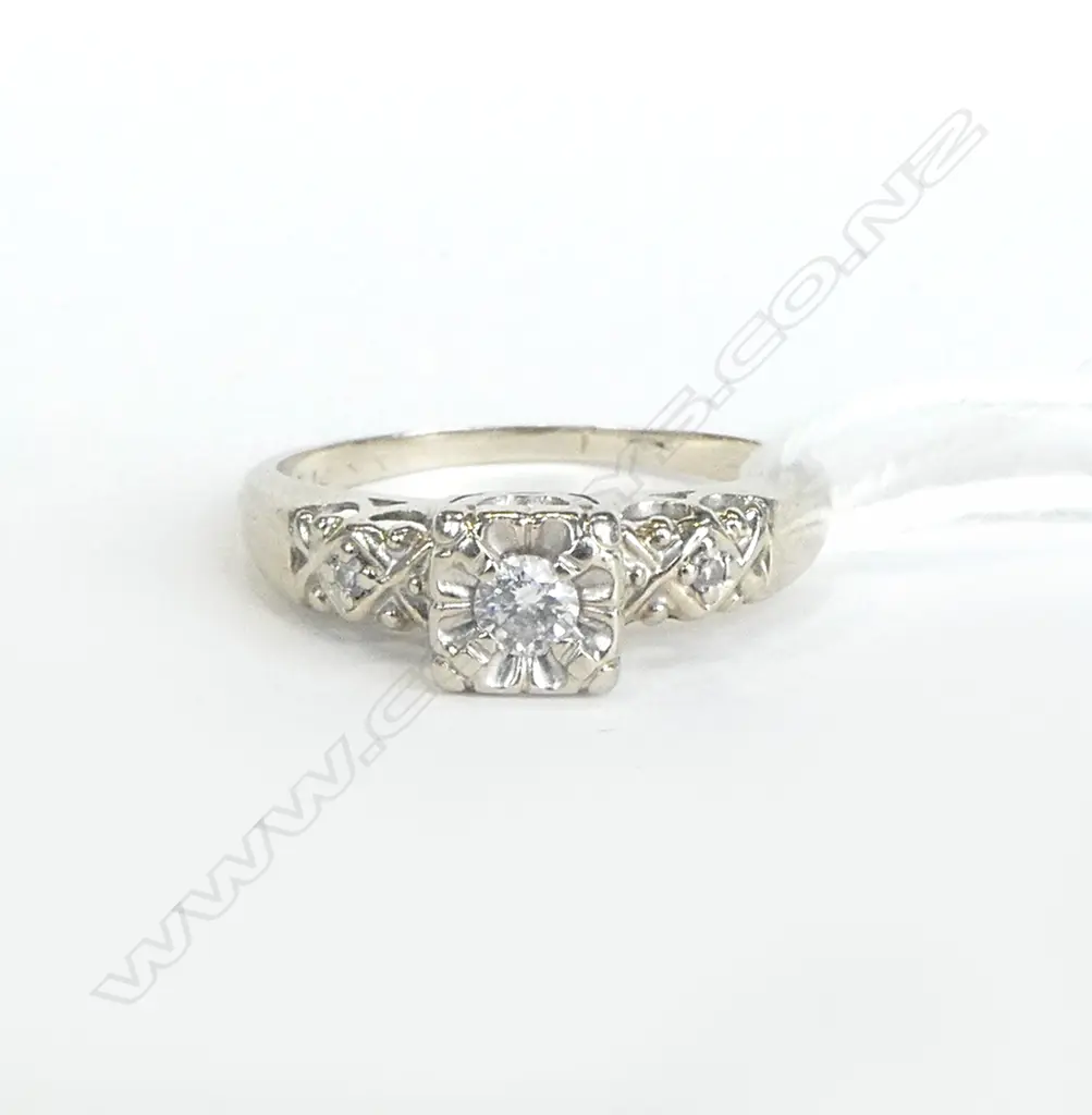 GOLD ILLUSION SET DIAMOND RING with small diamond shoulder detail  2.1 grams. size K (stamped 14k tests as 8-9k gold) Image 1++