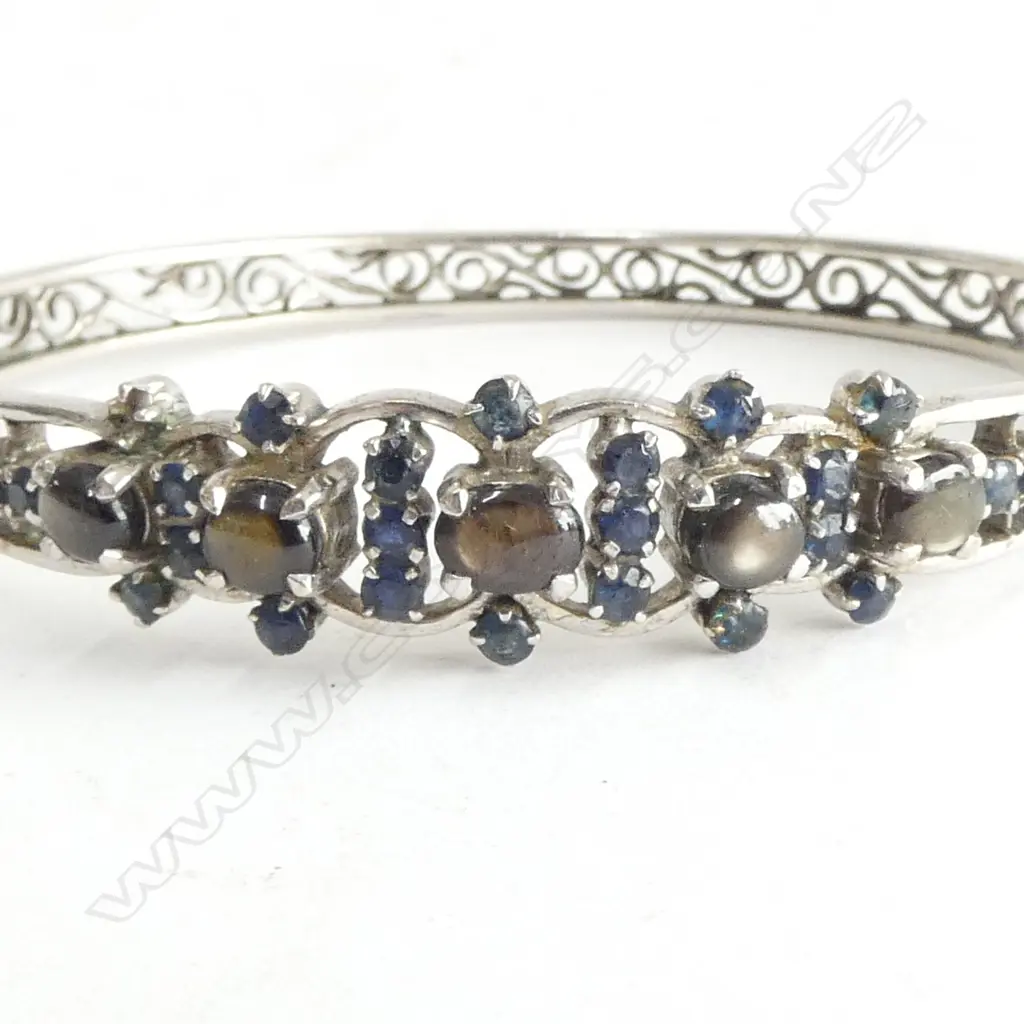 HINGED SAPPHIRE BANGLE stamped 18ct but unlikely Image 1++