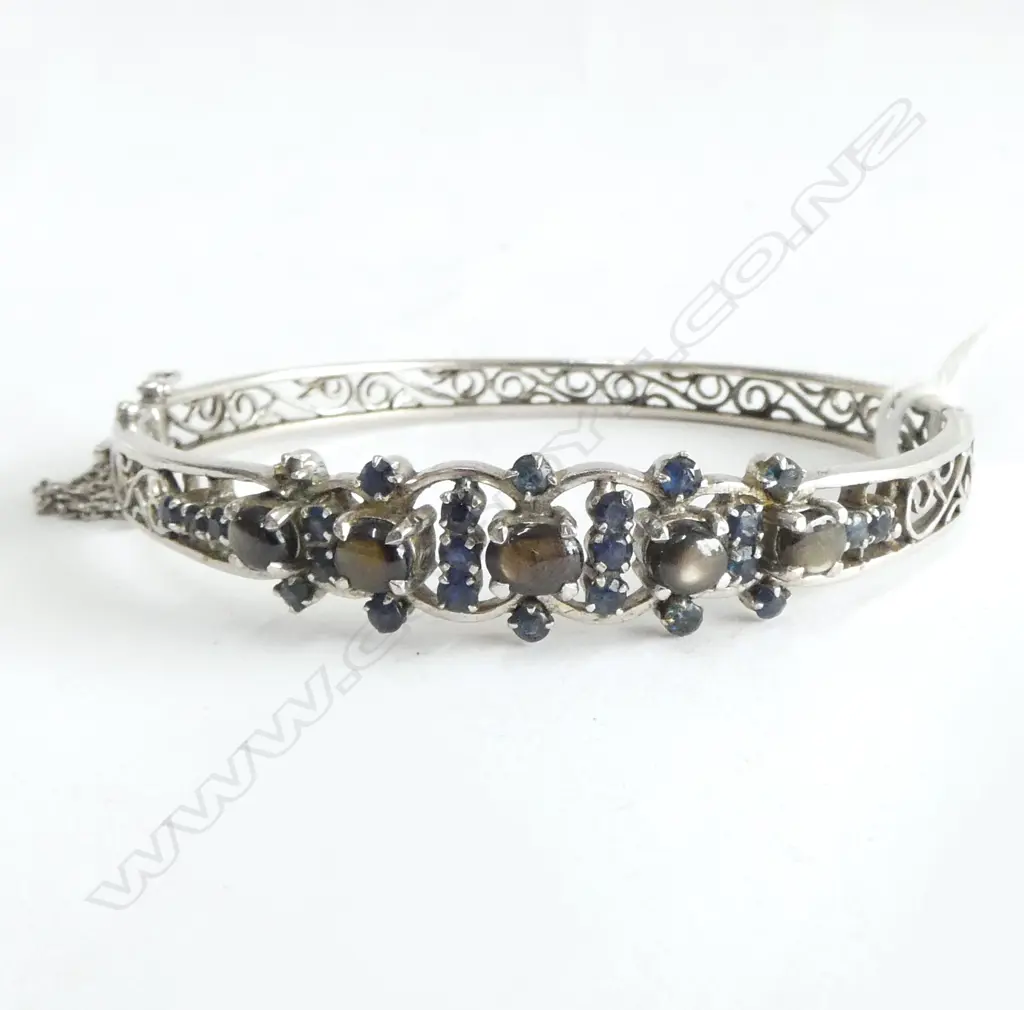 HINGED SAPPHIRE BANGLE stamped 18ct but unlikely Image 1++