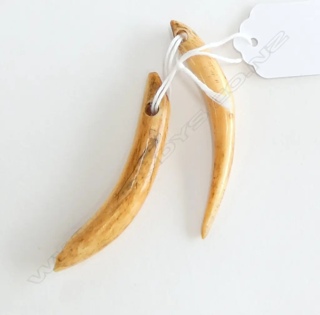 2 TUSKS; HAND CUT SUSPENSION HOLES L.67mm Image 1++