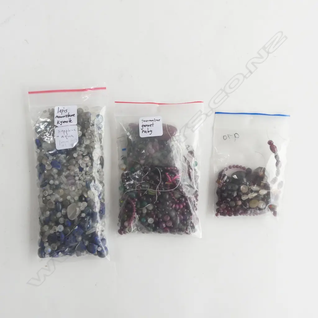 3 BAGS ASST. LOOSE BEADS INCLDS; TOURMALINE, GARNET, RUBIES, LAPIS, MOONSTONE, KYANITE Image 1++
