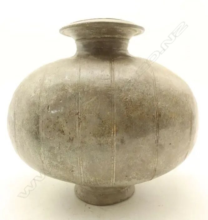 A Chinese Qin and Han Dynasty style grey Pottery 'Cocoon' Jar small chip to foot. H.230mm-John Perry Collections Image 1++