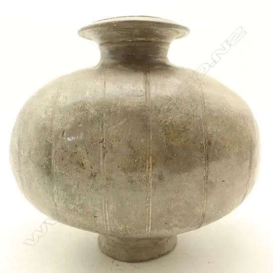 A Chinese Qin and Han Dynasty style grey Pottery 'Cocoon' Jar small chip to foot. H.230mm-John Perry Collections