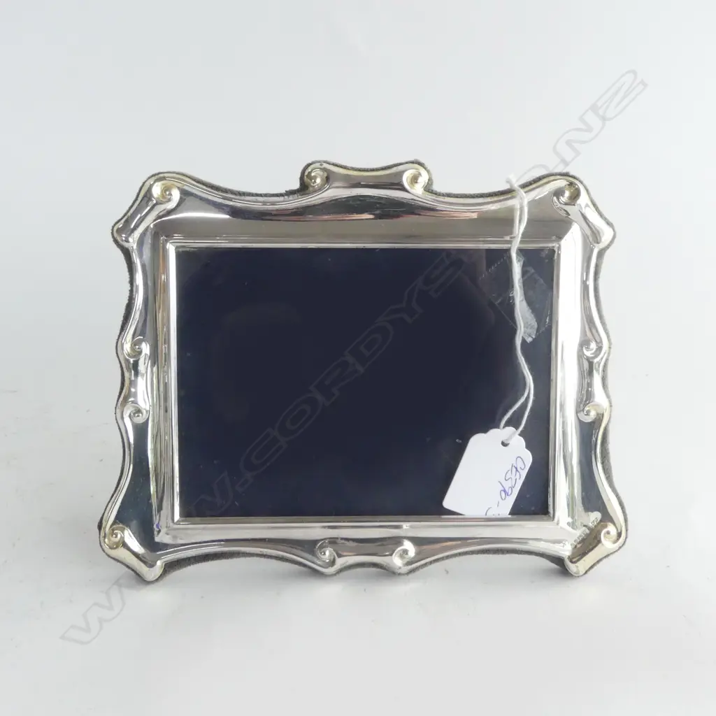 SILVER PHOTO FRAME with scroll detail. Landscape format. Blue velvet backing 150 x 195mm Image 1++