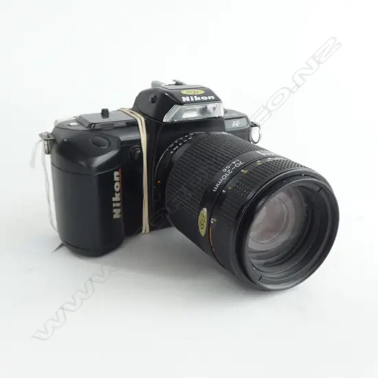 NIKON F-401 FILM CAMERA with 70-210mm nikon AK Nikkor lens + booklet