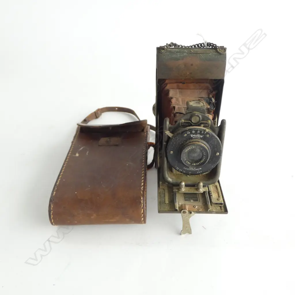 VINTAGE 'ENSIGN CARBINE TROPICAL MODEL' FOLDING CAMERA. metal finish. Red bellows. Showing some age. In leather case Image 1++