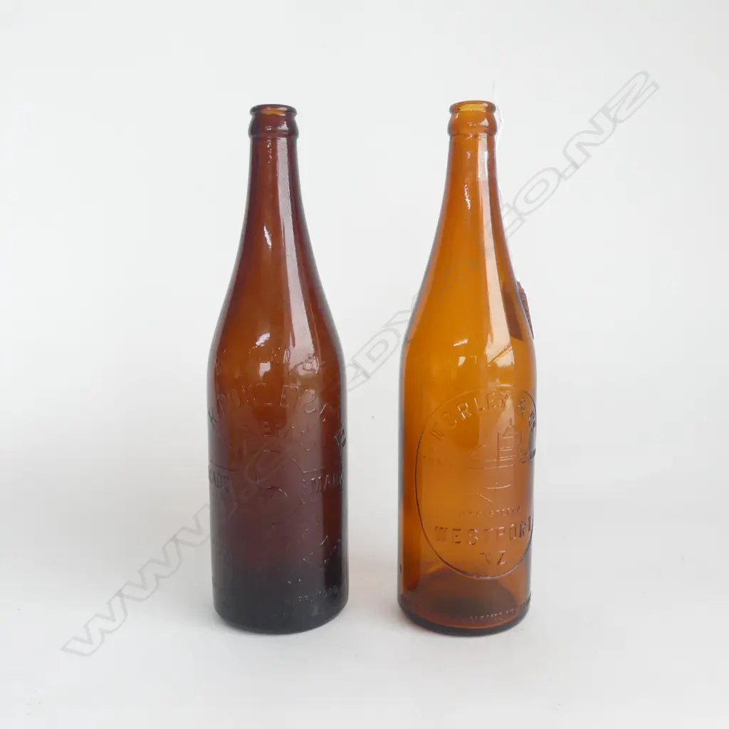 2 ANTIQUE AMBER GLASS BOTTLES; MORLEY & Co WESTPORT, R. POWLEY & Co DUNEDIN H.295mm Image 1++