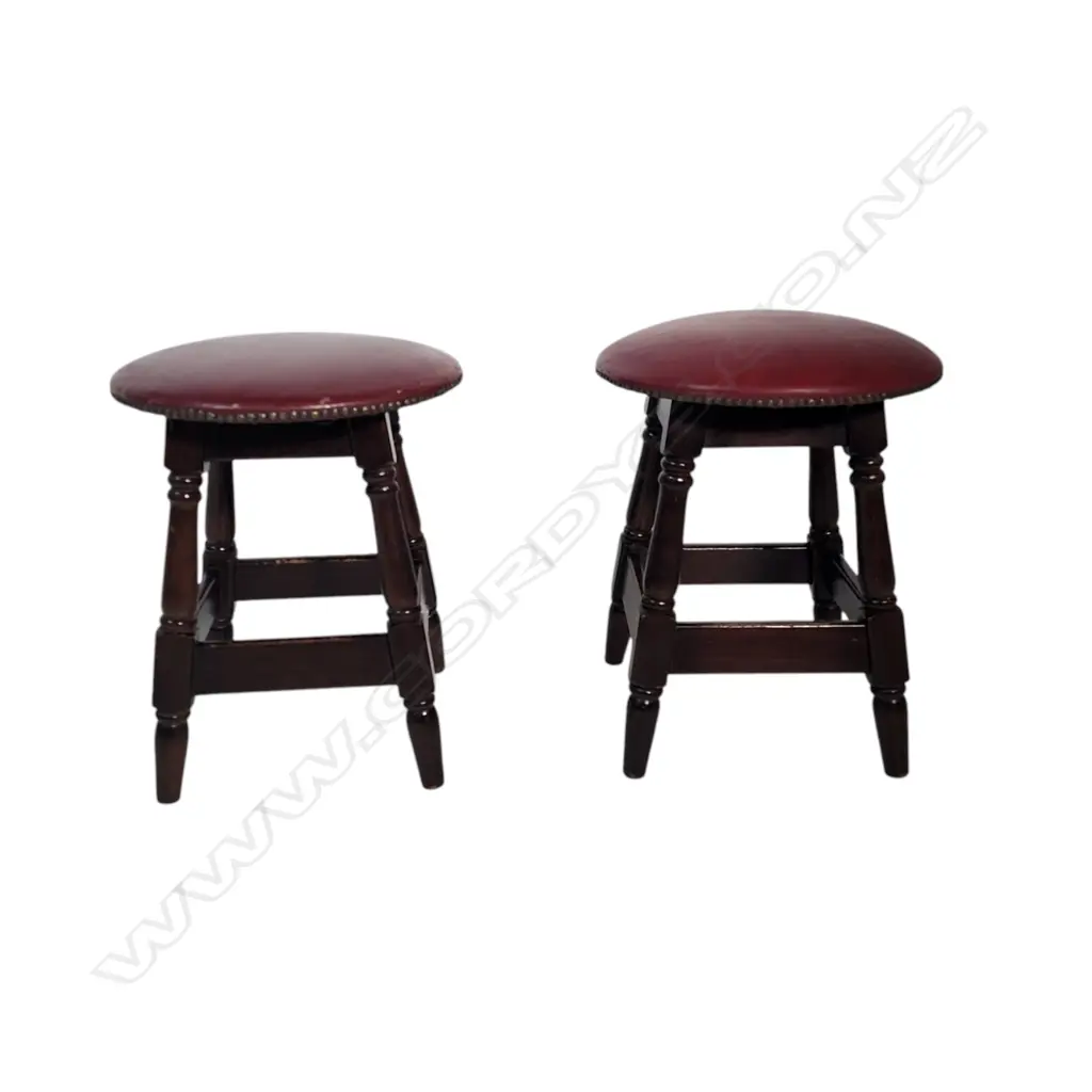 HEAVY PAIR OF VINTAGE WOODEN STOOLS – DARK WOOD WITH RED UPHOLSTERED SEATS AND NAILHEAD TRIM. Image 1++