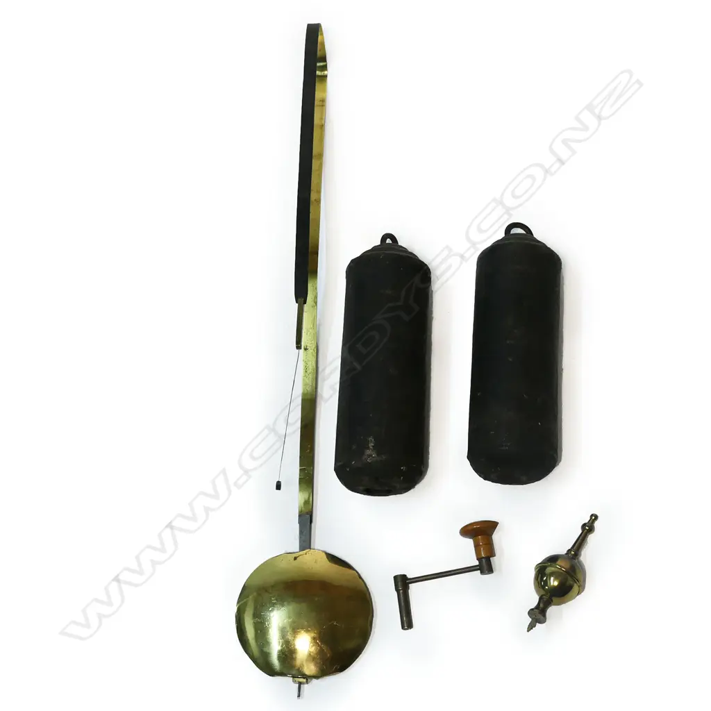 A Georgian oak long case clock - the hood with two finials, (one absent), reeded column with brass detail to each side, the dial with painted floral decoration, Roman numerals with the minutes in Arabic numerals, seconds dial, marked Edwd. Maud, Daventry, chamfered sides to case. 460 x 240 x 2600mm. Image 1++