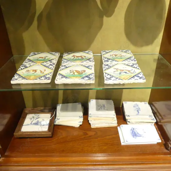 21 DELFT TILES, 2 FRAMED
