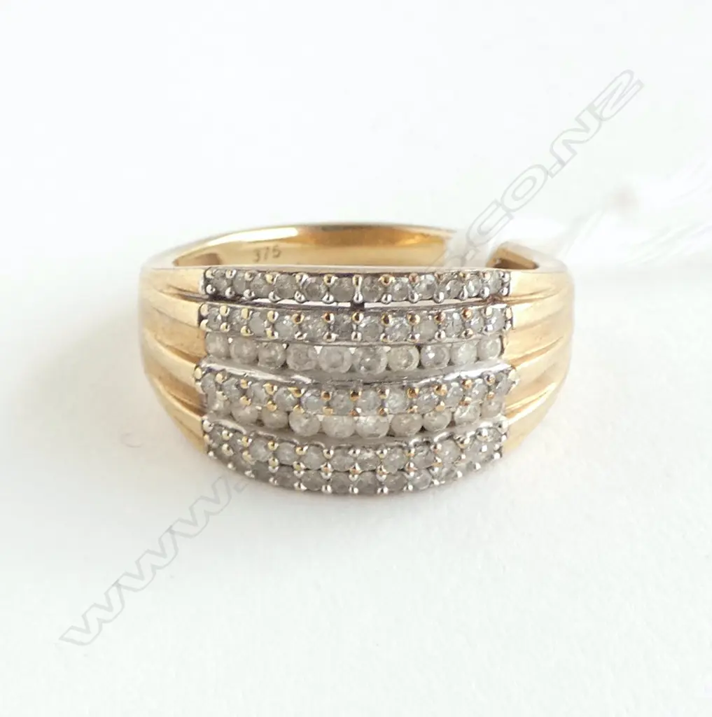9ct Y/GOLD & MULTI small DIAMOND 7 band RING 3.78gms. SIZE N Image 1++