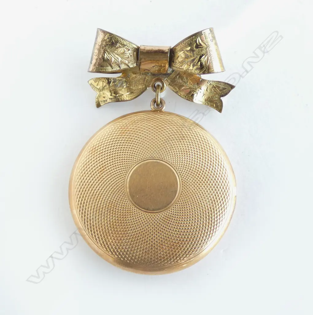 15CT LOCKET (10.3grm APPROX) ON RG BOW BROOCH 13.7grms total Image 1++