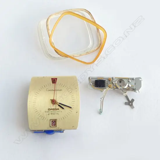 VINTAGE OMEGA CONSTELATION  ELECTRO HUMMING WRISTWATCH MOVEMENT only with glass & seals