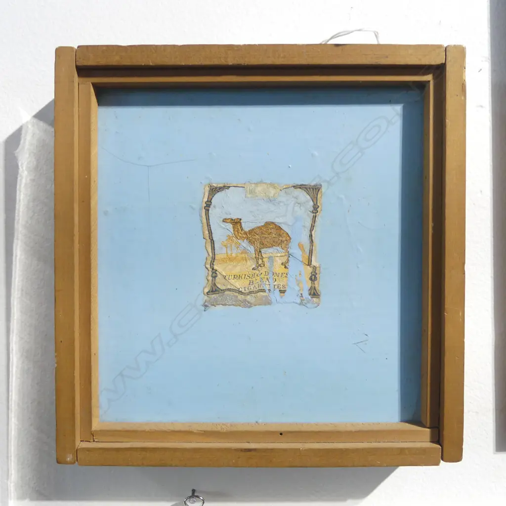 Frank Womble (1946-) 'Early Workz' painted assemblage 170mm x 165mm. Another work verso. Cigarette label & blue enamel. Provenance: From an artists estate Image 1++