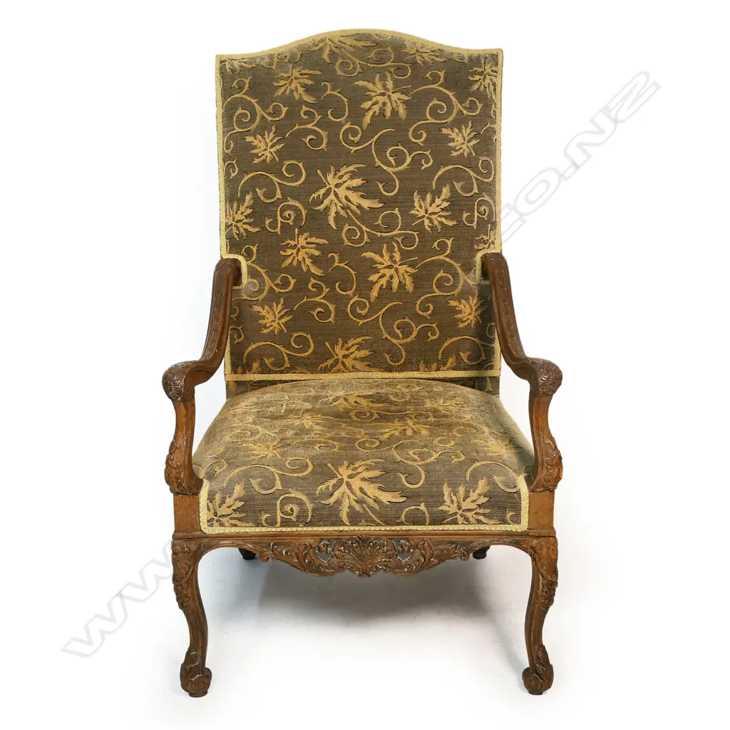 A 19thC oak baronial chair - carved oak frame upholstered in a self-patterned fabric. 730 x 800 x 1200mm. Image 1++