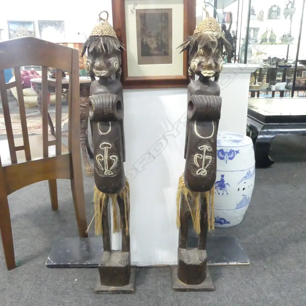 A PAIR OF TALL WOODEN CARVED ETHNIC FIGURES W. FEATHERS, H.1020MM Image 1++