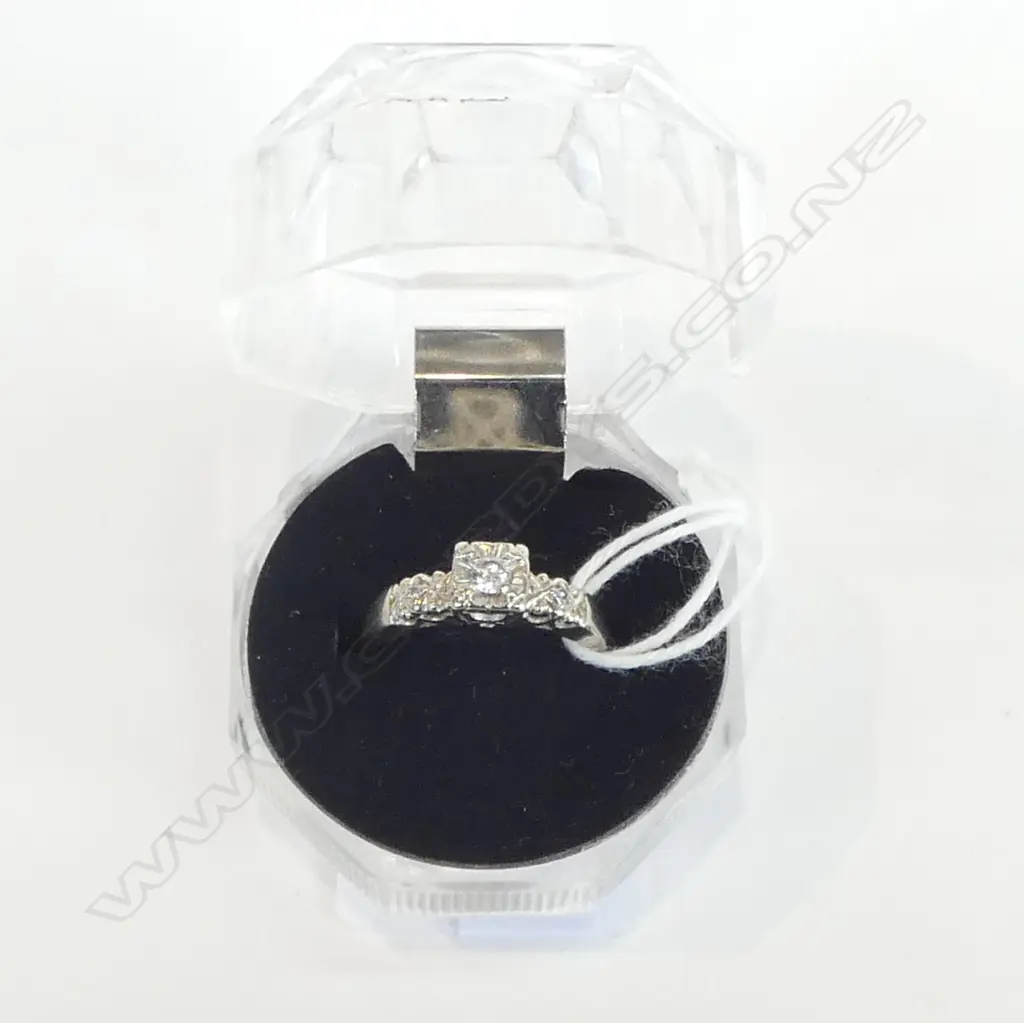 GOLD ILLUSION SET DIAMOND RING with small diamond shoulder detail  2.1 grams. size K (stamped 14k tests as 8-9k gold) Image 1++